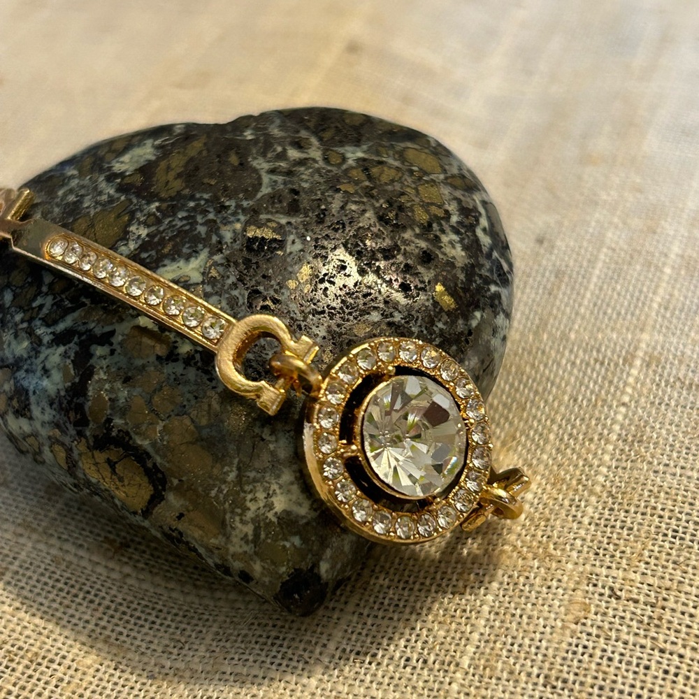 Gold and cubic zirconia focal stone with smaller cz’s each side. - Picture 6 of 9